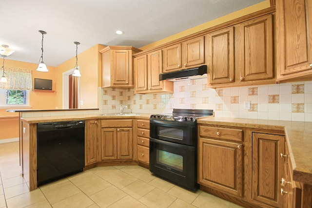 604 Adens Woods Ct, Columbia, MO 65201 - kitchen with black appliances, under cabinet range hood, a peninsula, tasteful backsplash, and hanging light fixtures