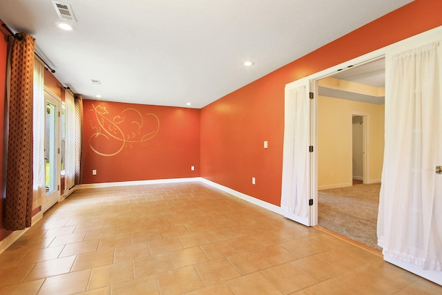 604 Adens Woods Ct, Columbia, MO 65201 - spare room with recessed lighting, light tile patterned floors, and a barn door