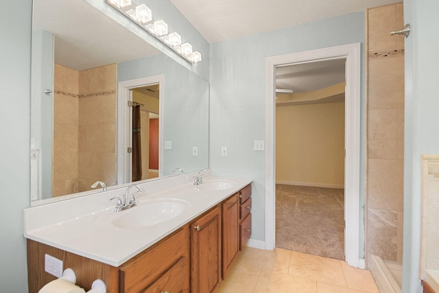 604 Adens Woods Ct, Columbia, MO 65201 - full bathroom with double vanity, tile patterned floors, and a tile shower