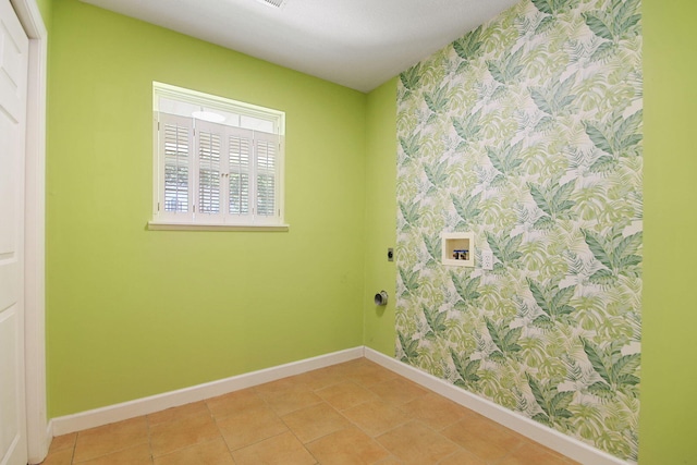 604 Adens Woods Ct, Columbia, MO 65201 - laundry room with wallpapered walls, washer hookup, electric dryer hookup, and light tile patterned floors