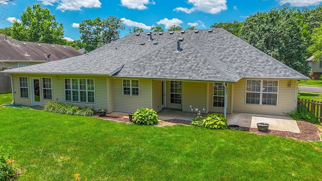 604 Adens Woods Ct, Columbia, MO 65201 - back of property featuring a shingled roof and a patio