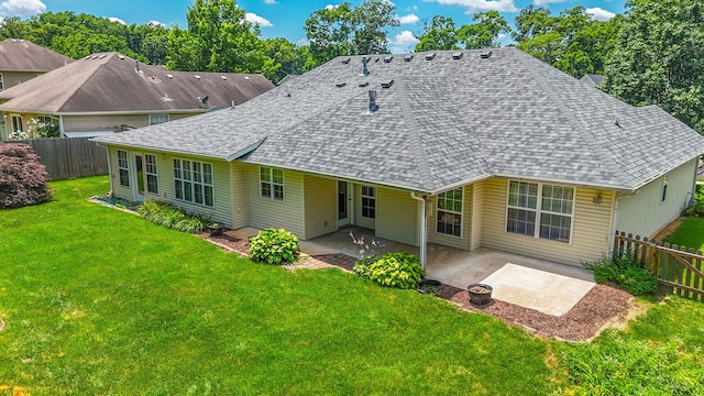 604 Adens Woods Ct, Columbia, MO 65201 - rear view of house featuring a shingled roof and a patio area