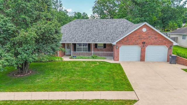 604 Adens Woods Ct, Columbia, MO 65201 - view of front facade featuring an attached garage, a porch, a front yard, and brick siding