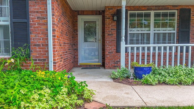 604 Adens Woods Ct, Columbia, MO 65201 - property entrance with brick siding and a porch