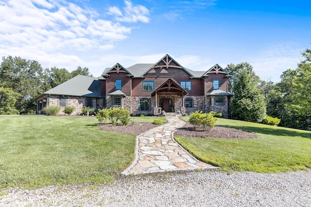 craftsman inspired home featuring a front yard