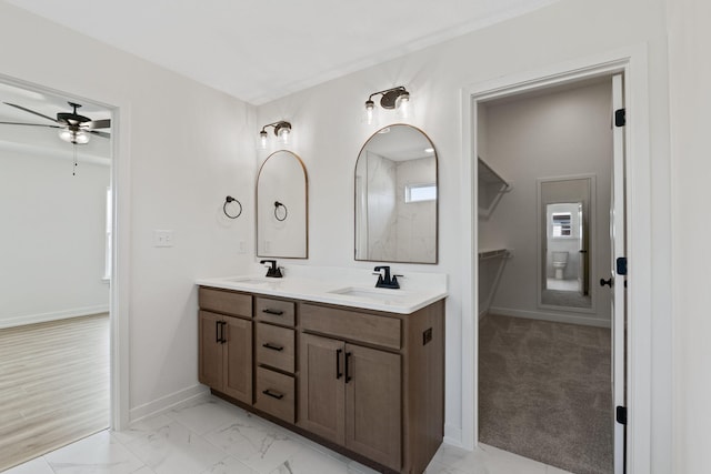 bathroom with vanity and ceiling fan