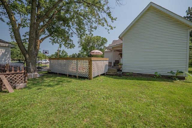 view of yard featuring a deck