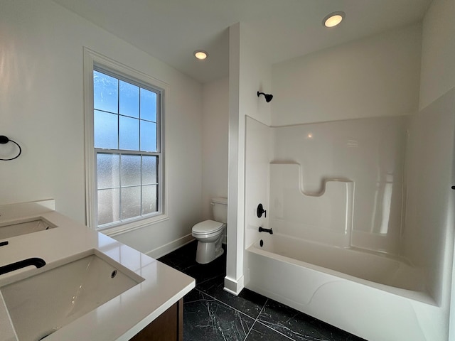 full bathroom featuring marble finish floor, recessed lighting, shower / bathing tub combination, toilet, and a sink