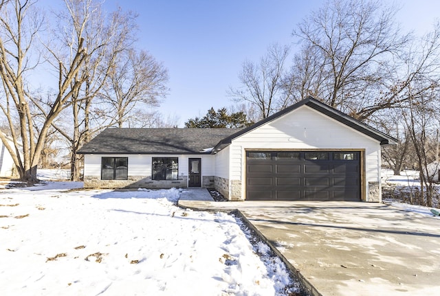 single story home featuring a garage