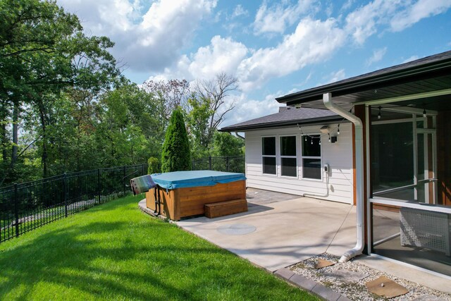 view of yard featuring a patio and a hot tub