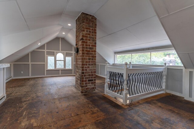 additional living space with plenty of natural light, vaulted ceiling, and recessed lighting