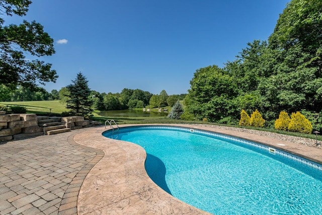 pool featuring a patio area