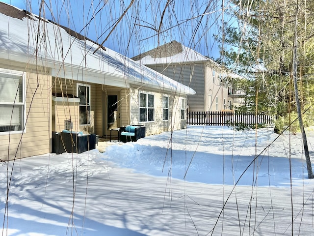 view of snow covered property