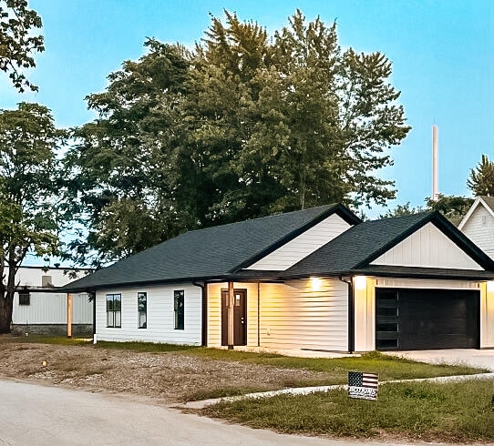 view of front of property with a garage