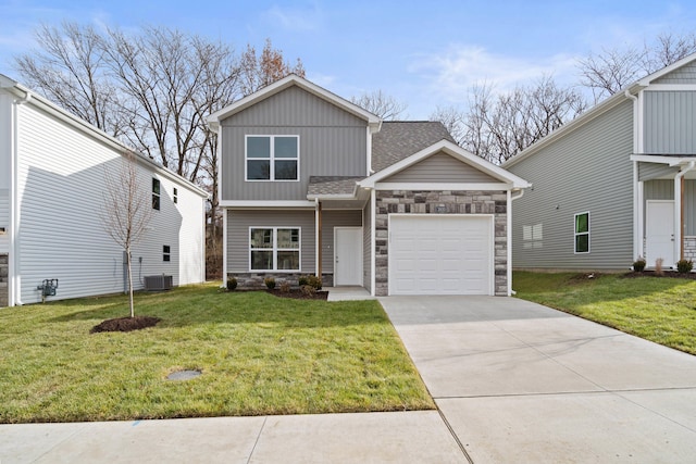 view of front facade featuring a garage, a front lawn, and central air condition unit