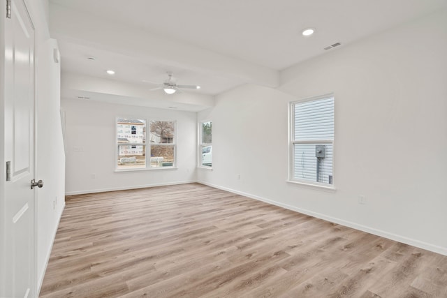 empty room featuring light hardwood / wood-style floors and ceiling fan