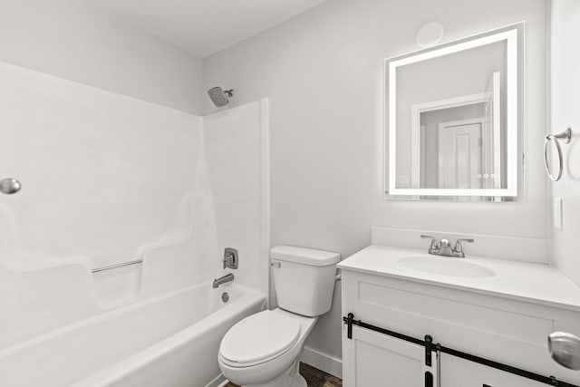 full bathroom featuring shower / bathing tub combination, vanity, and toilet