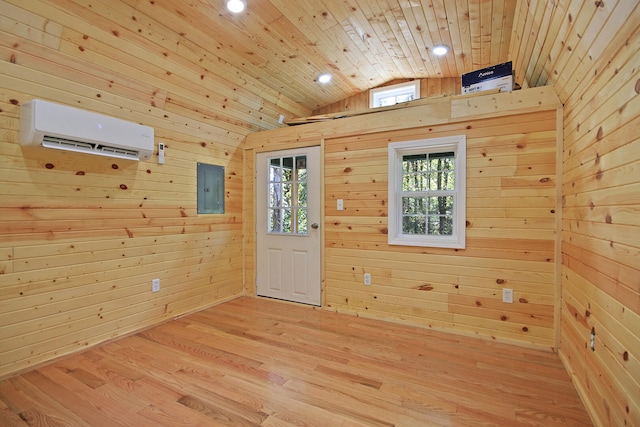 entrance foyer featuring wood ceiling, wood walls, an AC wall unit, and vaulted ceiling