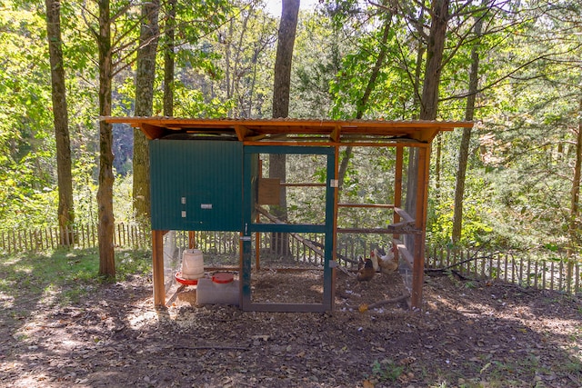 view of poultry coop with fence