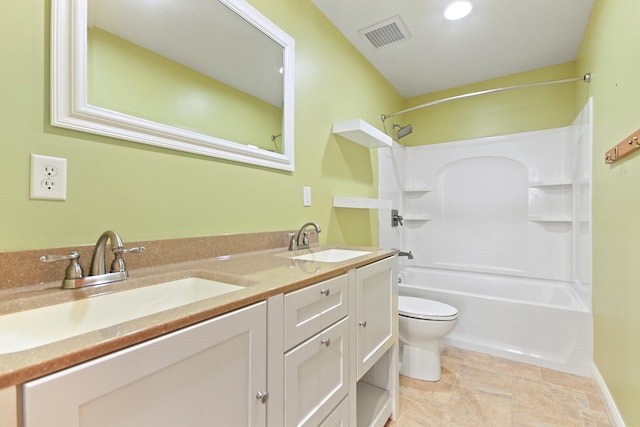 bathroom featuring washtub / shower combination, double vanity, a sink, and visible vents