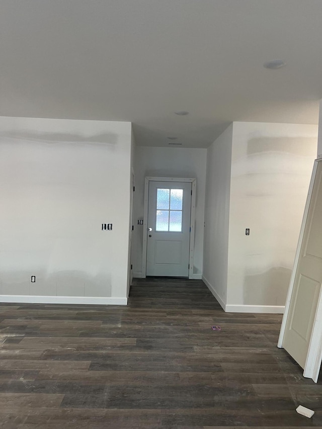 interior space with dark hardwood / wood-style floors