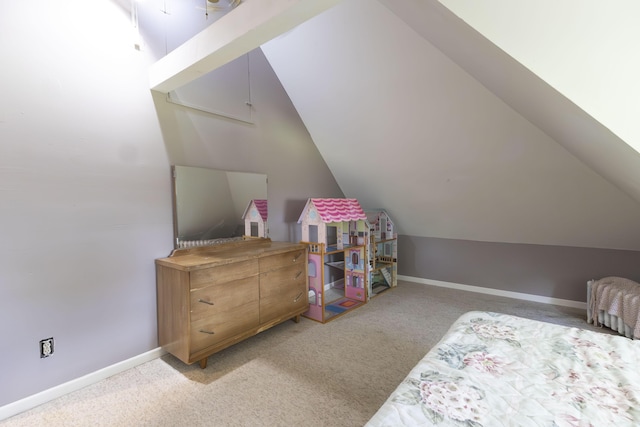 carpeted bedroom featuring lofted ceiling