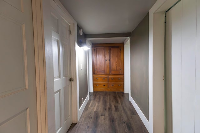 hall with dark hardwood / wood-style floors