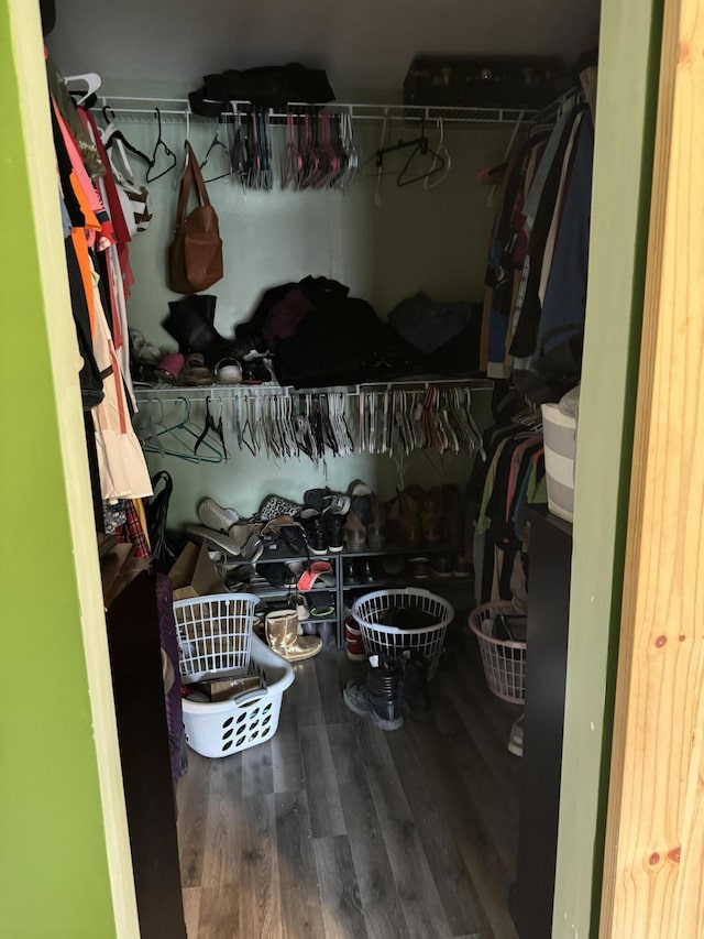 spacious closet featuring hardwood / wood-style flooring