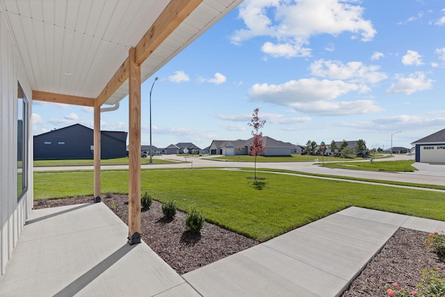 view of yard featuring a residential view