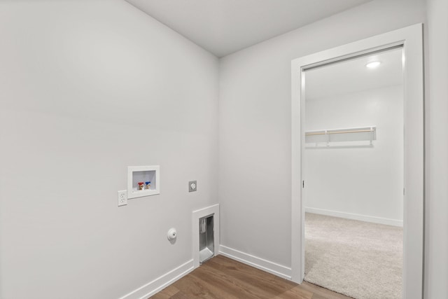 laundry room featuring electric dryer hookup, baseboards, laundry area, and washer hookup