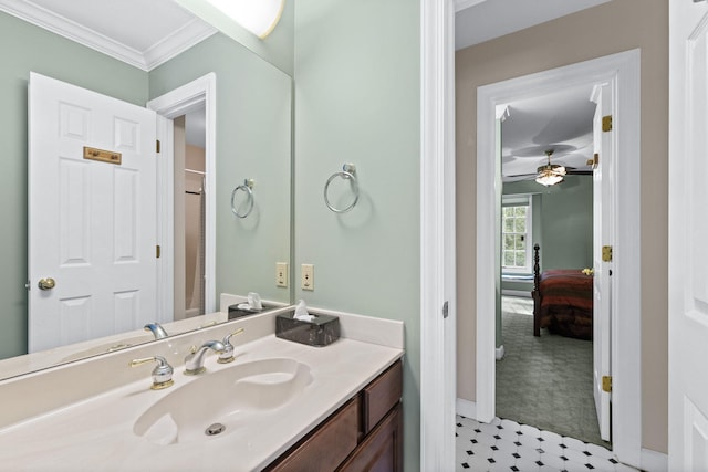 bathroom featuring ornamental molding and vanity