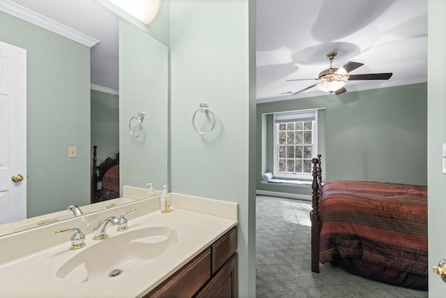 bathroom featuring ceiling fan, ornamental molding, ensuite bath, and vanity