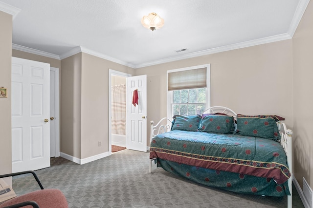 bedroom with carpet, visible vents, crown molding, and baseboards