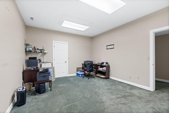 office area featuring dark carpet, visible vents, and baseboards