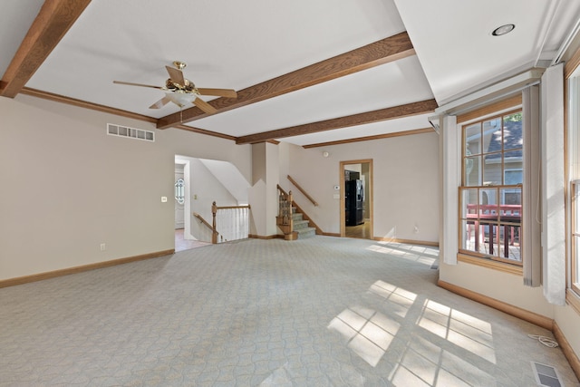 unfurnished living room with light carpet, baseboards, visible vents, and beam ceiling