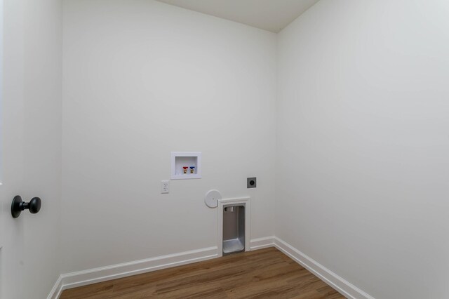 laundry area with hardwood / wood-style floors, washer hookup, and hookup for an electric dryer