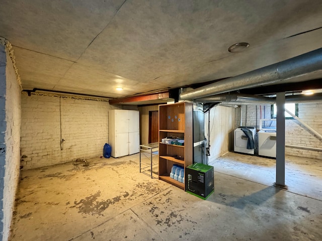 basement featuring washer and clothes dryer