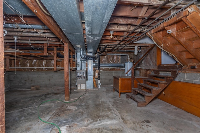 basement with heating unit and water heater