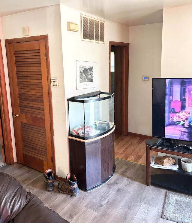 interior space with hardwood / wood-style flooring