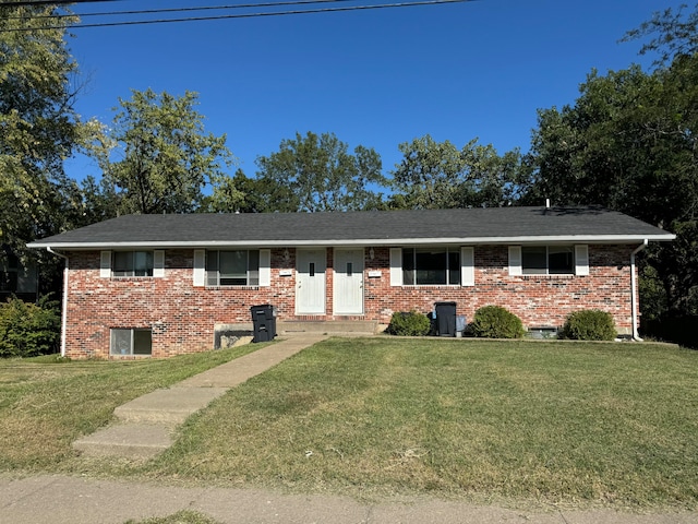 view of front facade with a front lawn