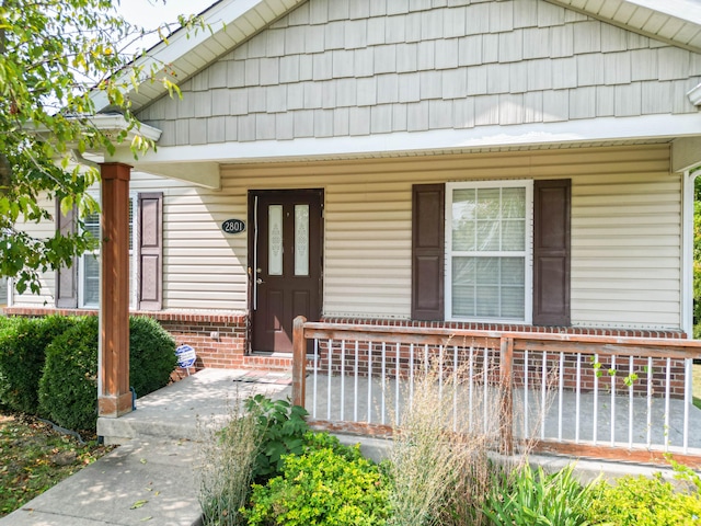 view of front of property featuring covered porch