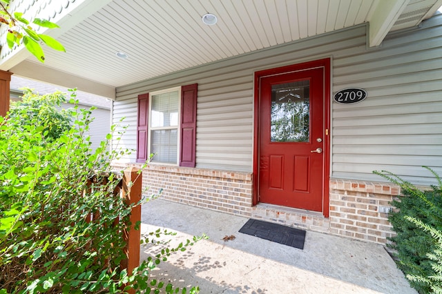 entrance to property with covered porch