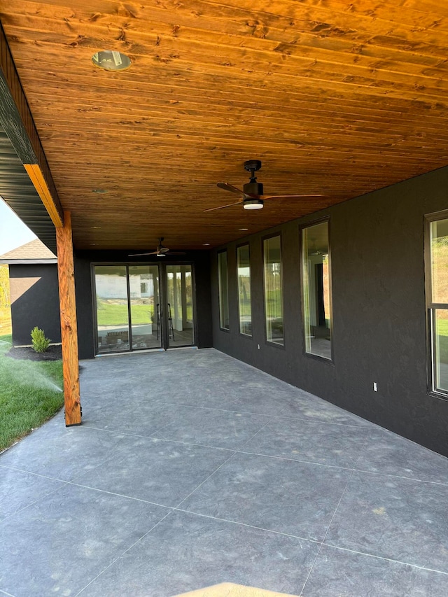 view of patio / terrace featuring ceiling fan