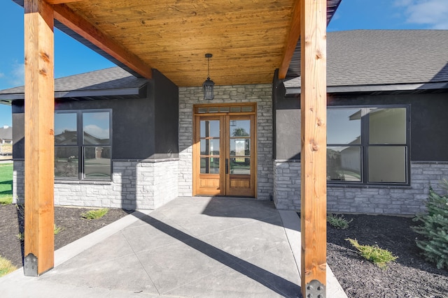 entrance to property featuring french doors