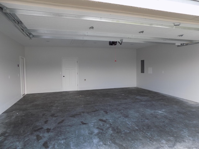 14 Carnival Ln, Centralia, MO 65240 - garage with electric panel and a garage door opener