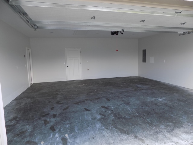 14 Carnival Ln, Centralia, MO 65240 - garage featuring a garage door opener and electric panel