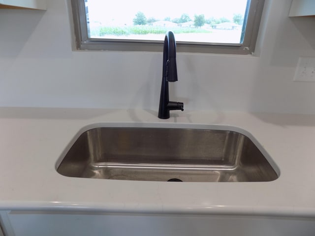 14 Carnival Ln, Centralia, MO 65240 - kitchen view of a sink and light countertops