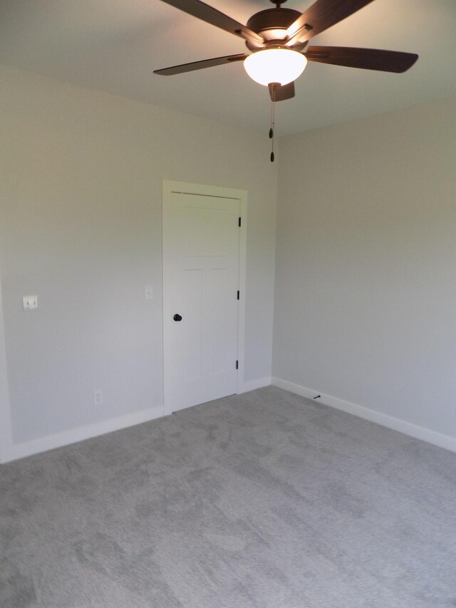 14 Carnival Ln, Centralia, MO 65240 - carpeted empty room with ceiling fan and baseboards