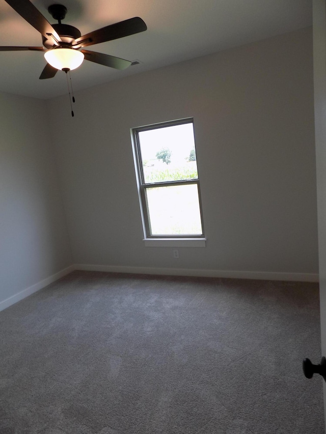 14 Carnival Ln, Centralia, MO 65240 - carpeted empty room featuring baseboards and a ceiling fan