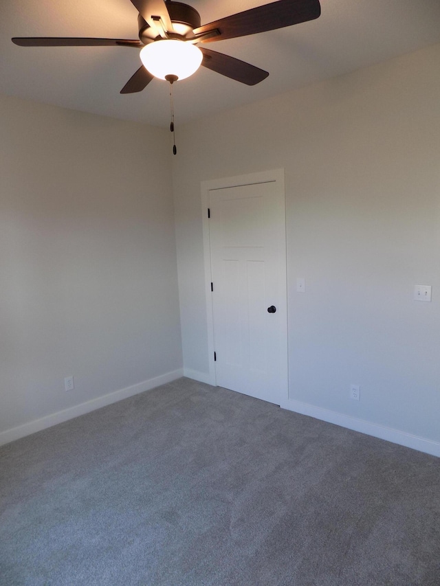 14 Carnival Ln, Centralia, MO 65240 - carpeted spare room featuring a ceiling fan and baseboards